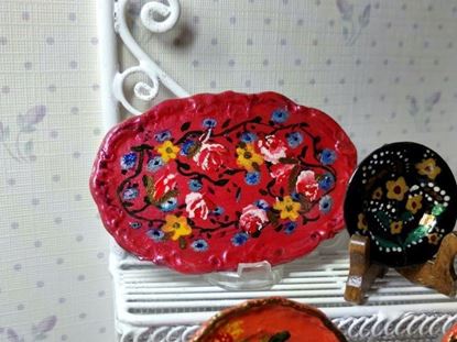 Picture of Hand painted platter or tray with flowers on pink background.