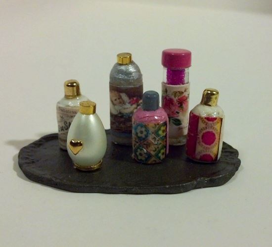 Picture of Miniature perfume and other vanity items on tray