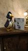 Picture of Dollhouse Jemima Puddle Duck and readable book about her.