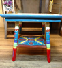 Picture of Hand painted dollhouse table.