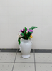Picture of Flower arrangement in a porcelain vase for dollhouse miniature setting.