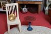 Picture of Two small dollhouse side tables.