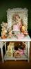 Picture of Full scale hand made doll with a beautiful dressed table