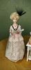 Picture of Full scale hand made doll with a beautiful dressed table
