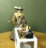 Picture of Hand made doll with a beautiful dressed jewelry counter.