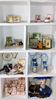 Picture of 27 lots of dollhouse miniature accessories.