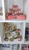 Picture of 18 lots of dollhouse miniature accessories.